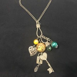 Charm necklace, yellow and green.